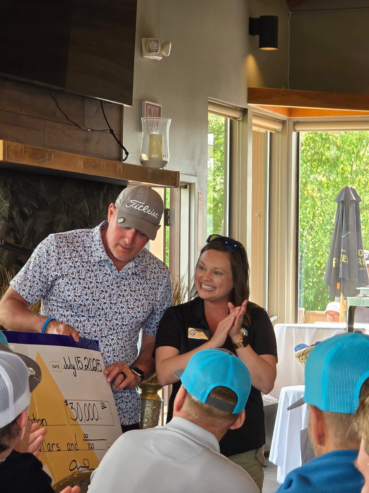 A community donation presented to the Alaska Fisher House
