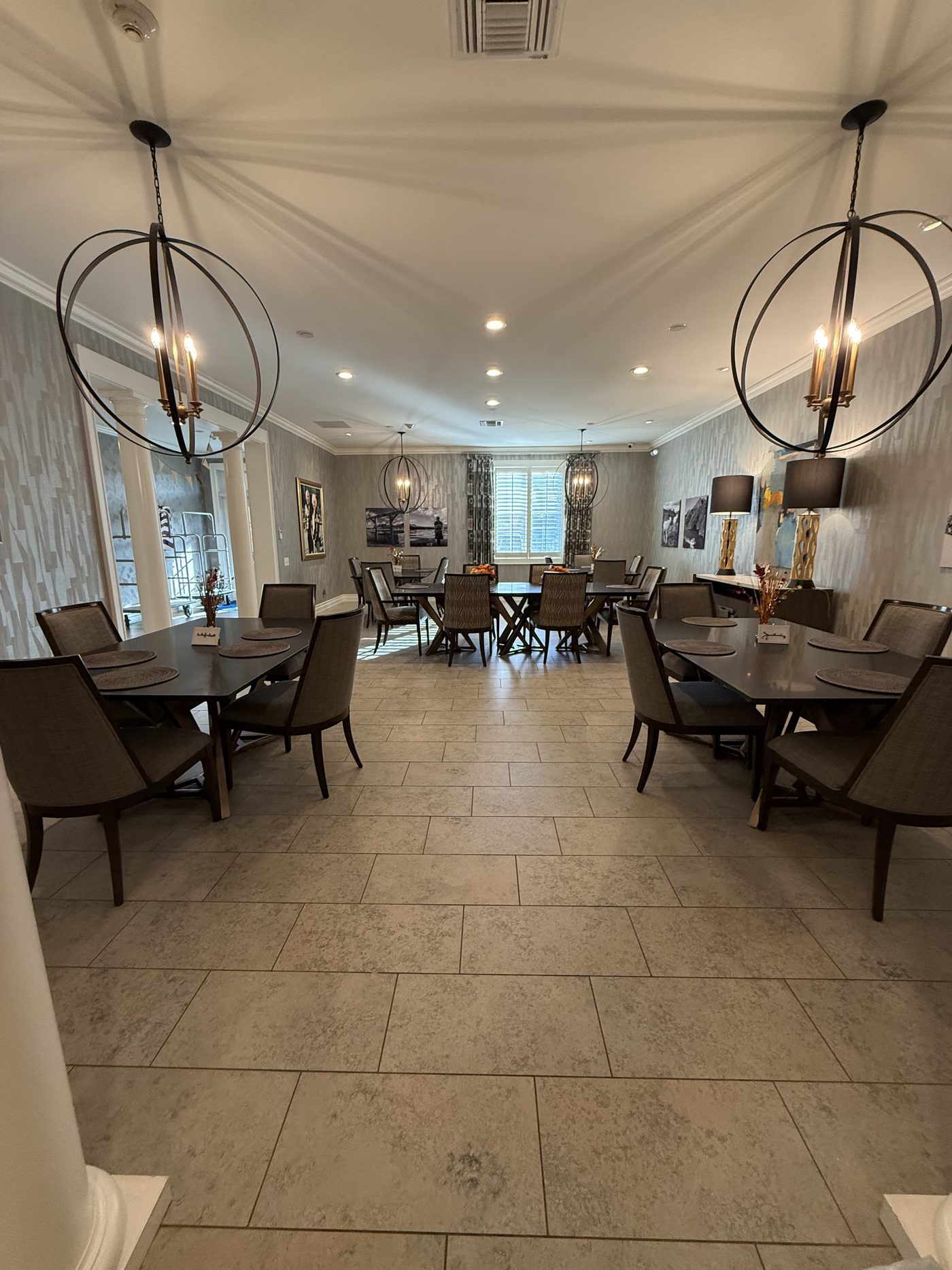 The open dining area at the Alaska Fisher House with globe pendant lights